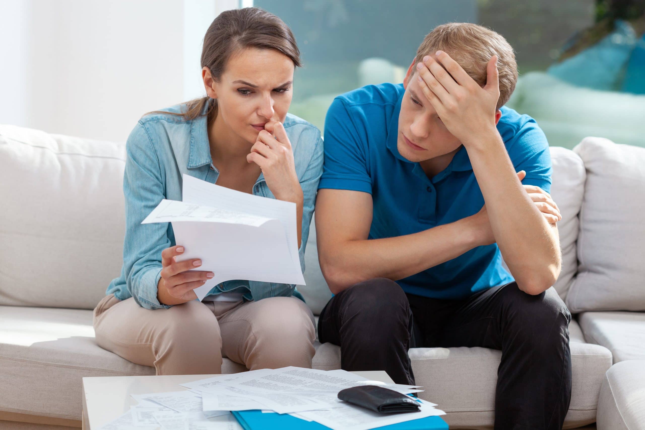 Young couple going through parent probate estate paperwork